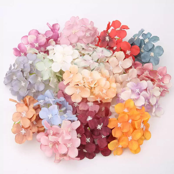 5cm Silk Hydrangea Flower Heads Pack 30 is a perfect addition to your floral supplies collection.