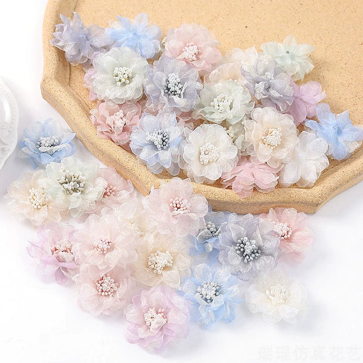 4cm Organza Fabric Flower Heads Pack 30 is a perfect addition to your decorative floral collection.