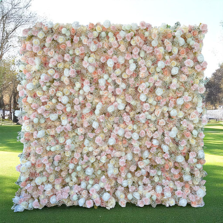 Elegant flower wall featuring roses and peonies in soft hues.

