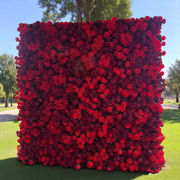 Luxurious deep red rose floral wall, perfect for romantic weddings and upscale events.