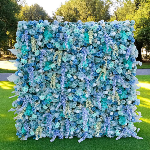Full front view of Arctic Bloomfall flower wall with cascading blue and white florals