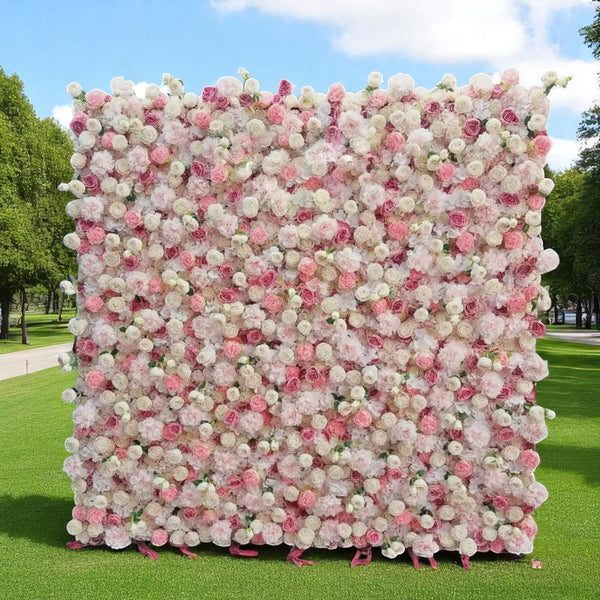 Soft pink and white rose flower wall, perfect for creating a romantic backdrop at weddings.