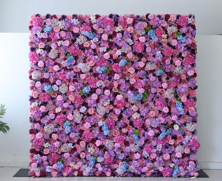 Mixed pink and purple artificial flower wall backdrop
