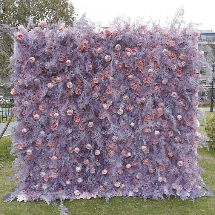 Elegant pink and lavender floral wall backdrop for weddings.
