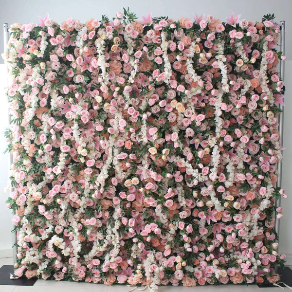 Pink and white cascading flower wall backdrop for weddings and events.
