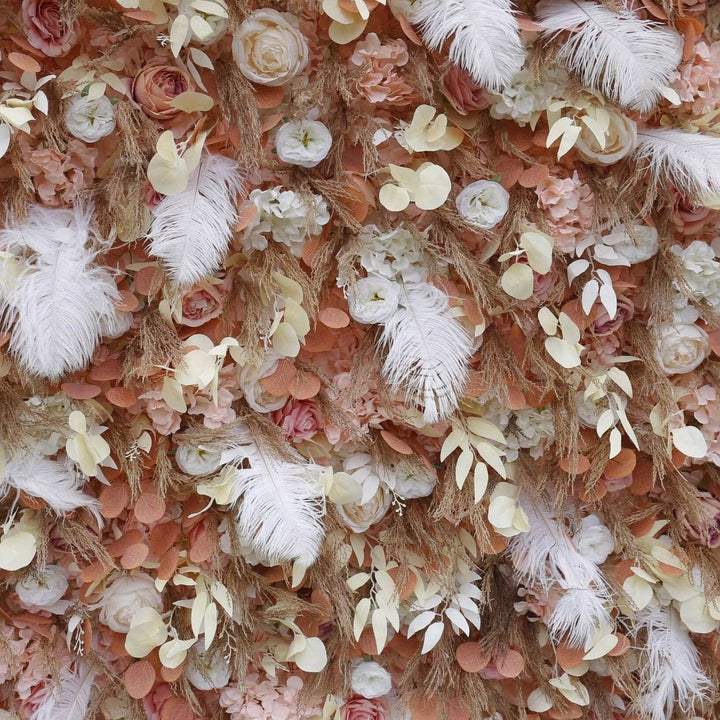 Vintage-inspired floral wall backdrop with delicate roses and elegant feathers.
