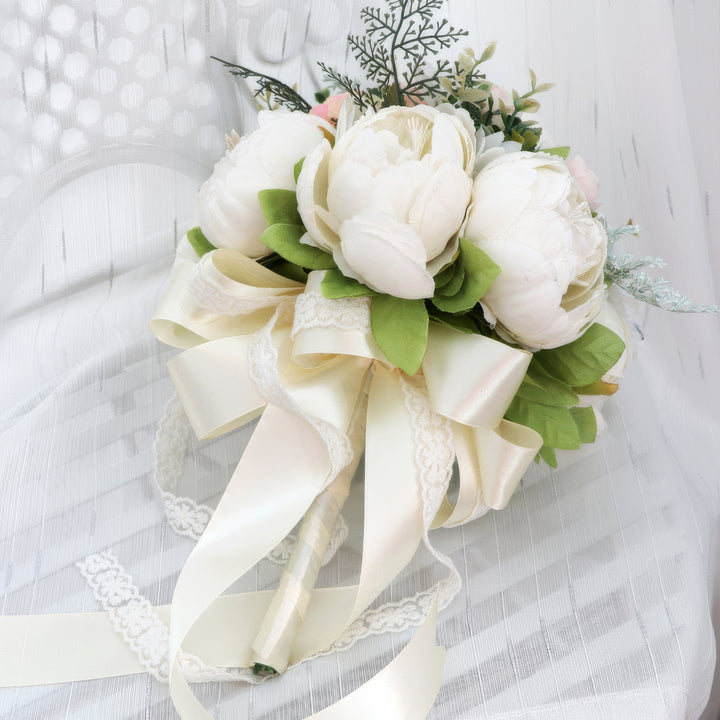 Elegant Bridal Bouquet with Peonies and Roses in Cream and Peach