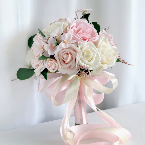 Delicate Bridal Bouquet with Soft Blush and Ivory Blooms