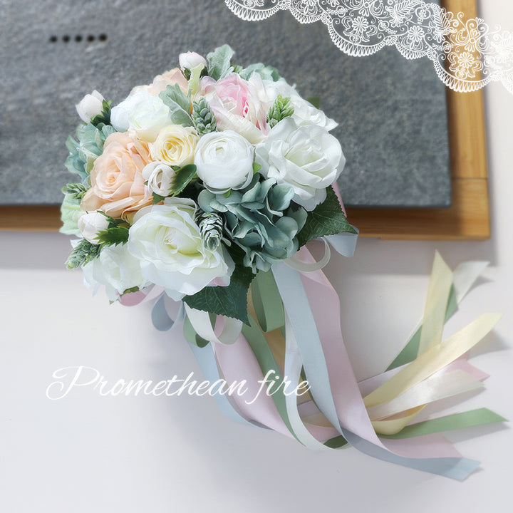 Enchanting Pastel Bridal Bouquet in Blush, Cream, and Sage Green