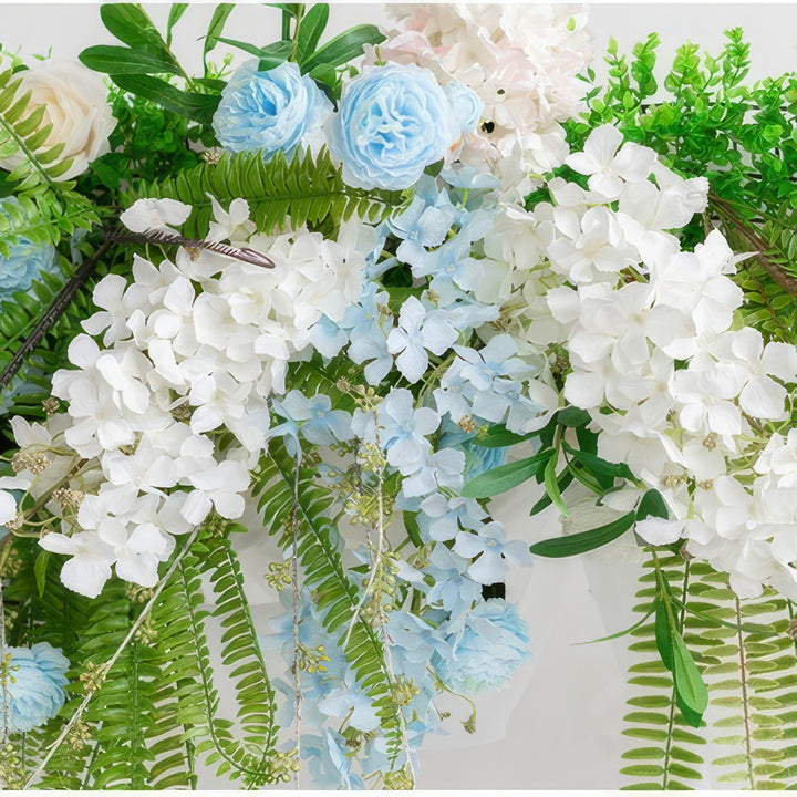 Pastel Blue & White Wedding Arch Decor With Hanging Greenery