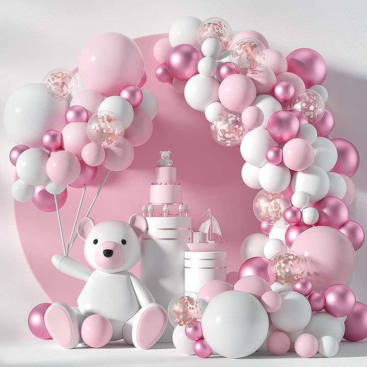 Pink and white balloon arch with teddy bear centerpiece
