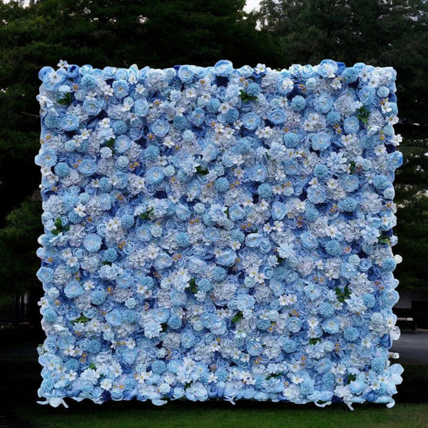 Light blue flower wall backdrop with layered artificial blooms