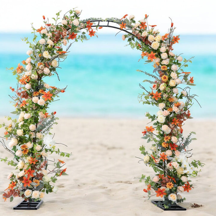 Orange Floral Wedding Arch Set for Wedding Party Decor Proposal standing on the beach