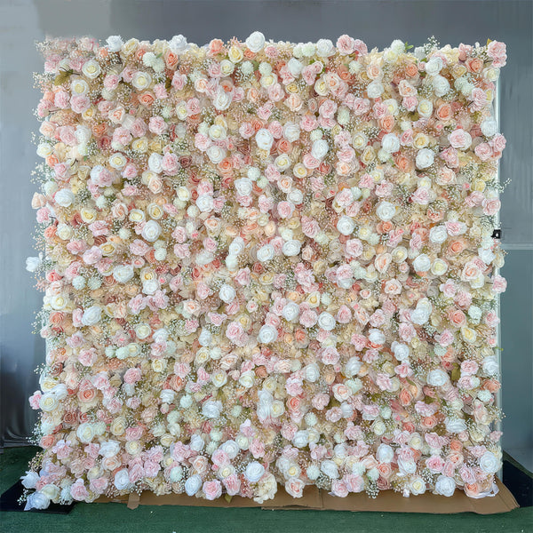 Elegant flower wall featuring roses and peonies in soft hues.
