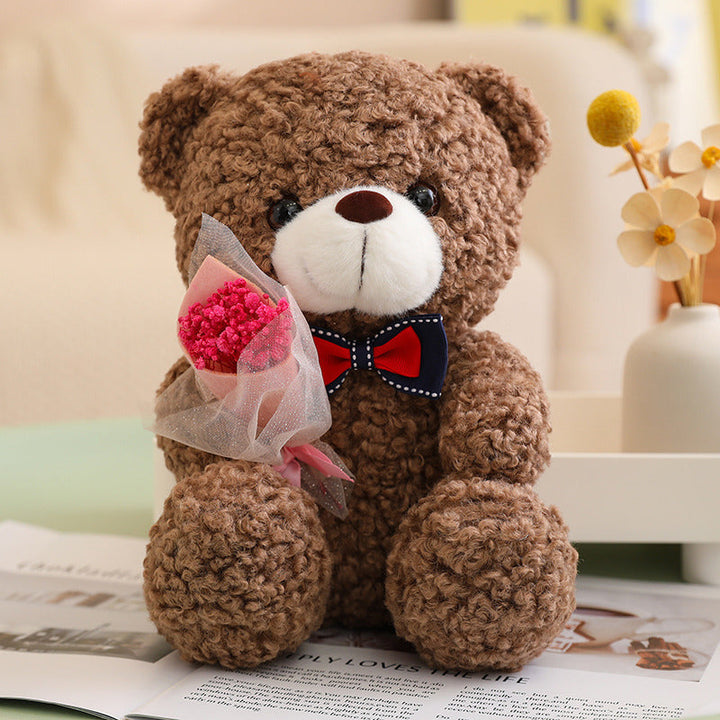 Teddy Bear Holding Bouquet 25cm is a delightful addition to your valentine's day bouquets collection.