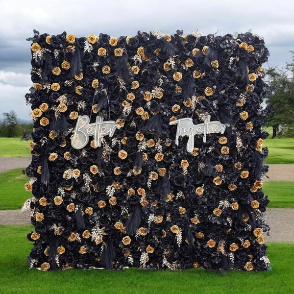 Black and gold flower wall backdrop with “Better Together” signage