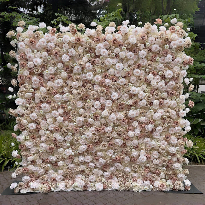 Champagne and blush floral wall backdrop with soft ivory roses.
