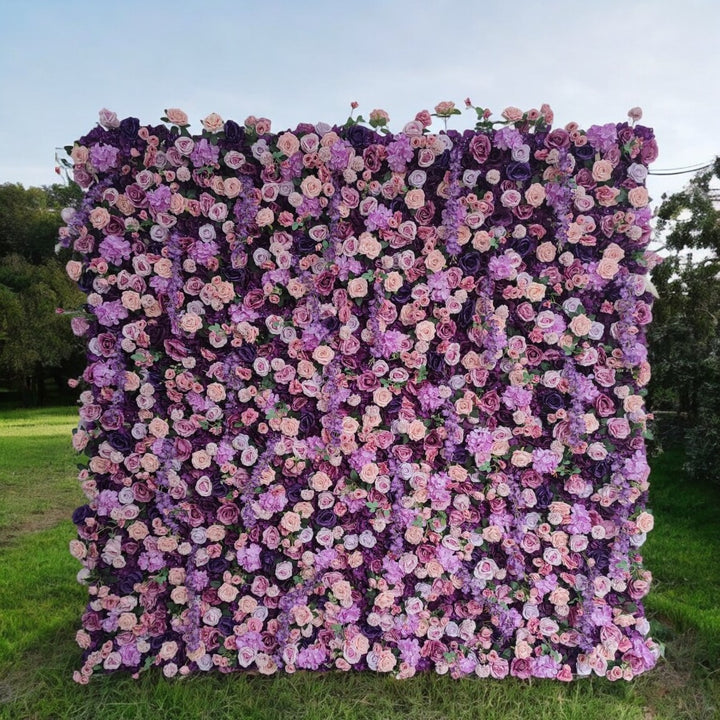 Purple Passion floral wall backdrop with violet and lavender roses.
