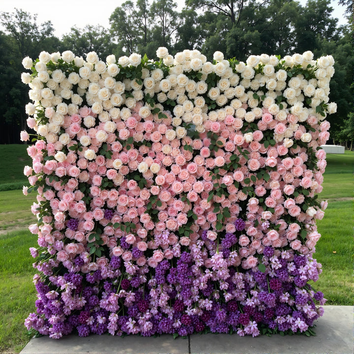 Pastel-colored floral wall backdrop with roses and lilacs for elegant events.