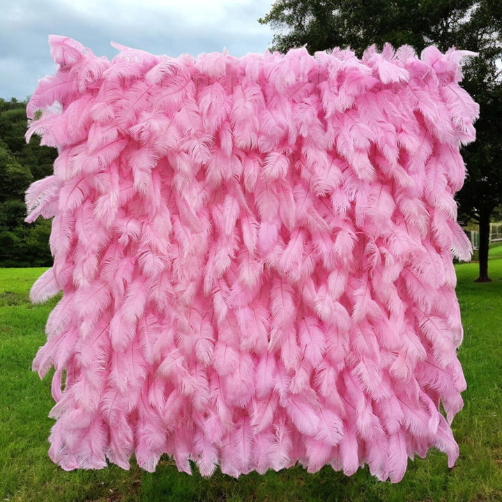 Pink feather flower wall backdrop for baby showers
