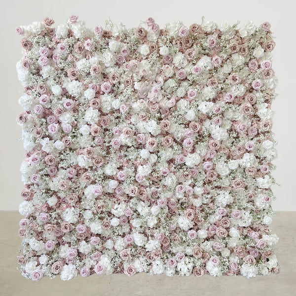 Romantic blush and white flower wall backdrop perfect for weddings.
