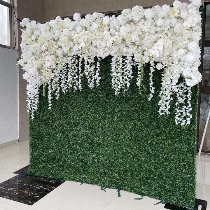 Elegant white flowers and orchids on greenery backdrop
